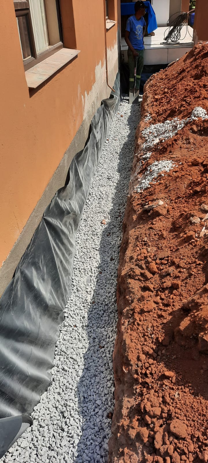 Waterproof membrane and trench backfill